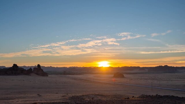 Time lapse of sunset sunrise in rock formation desert in Alula, Saudi Arabia.