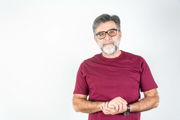 Caucasian handsome man isolated on grey background keeping the arms crossed in frontal position. 