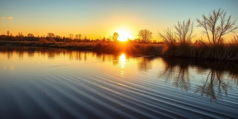 Obraz premium Golden hour sunlight paints serene well water, perfect reflection, tranquil stillness, golden light, calm