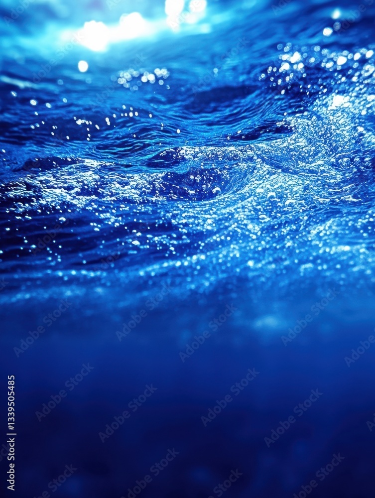 Poster underwater view of ocean waves with sunlight creating abstract patterns and deep blue gradient backg