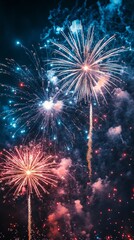 Obraz premium Background with bright fireworks in the dark sky will be a great choice for holiday cards, greetings or promotional materials related to celebrations and fun.