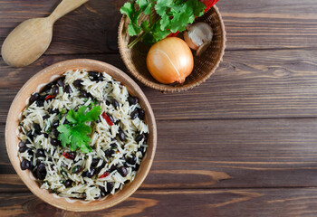 Traditional Costa Rican dish - Gallopinto. Black beans and rice stewed with onions, garlic,...