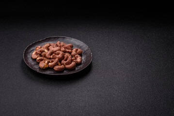 Cashew nuts in shell in bowl