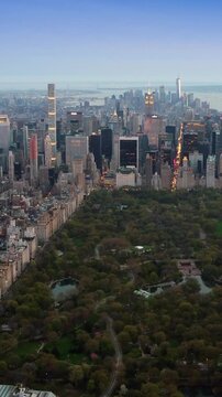 Beautiful aerial view of the Central Park in Midtown Manhattan. Iconic skyscrapers New York, United States. Shot from a helicopter