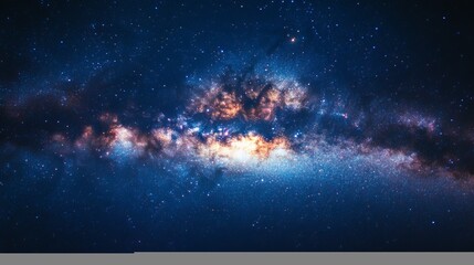 A closeup of the Milky Way galaxy highlighting bright stars and dense clouds of interstellar dust