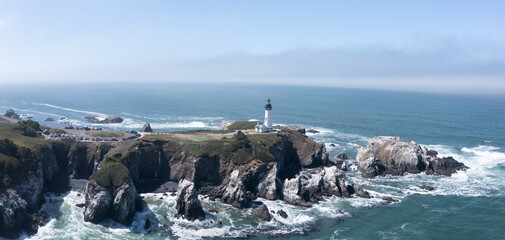 Drone photo of Yaquina Head Lighthouse at the Central Oregon Coast. 