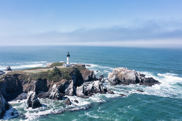 Drone photo of Yaquina Head Lighthouse at the Central Oregon Coast. 