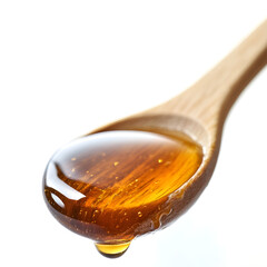 Wooden spoon dripping with golden honey on white background
