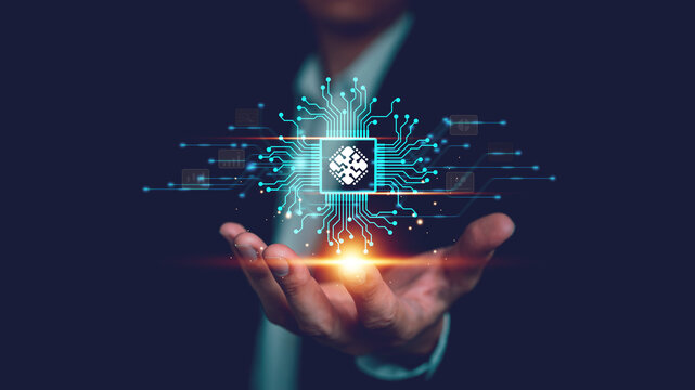 Businessman showing electronic circuit board chip, Concept of world of innovation, cutting edge technology, progress, modern high tech future