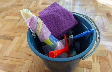 Bucket Filled with Cleaning Supplies