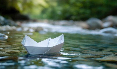 A paper boat is floating in a river