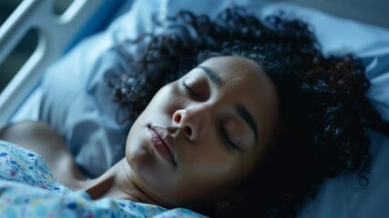 Calm video of a girl sleeping in a hospital room, perfect for medical videos, social projects and health and care related ads.
