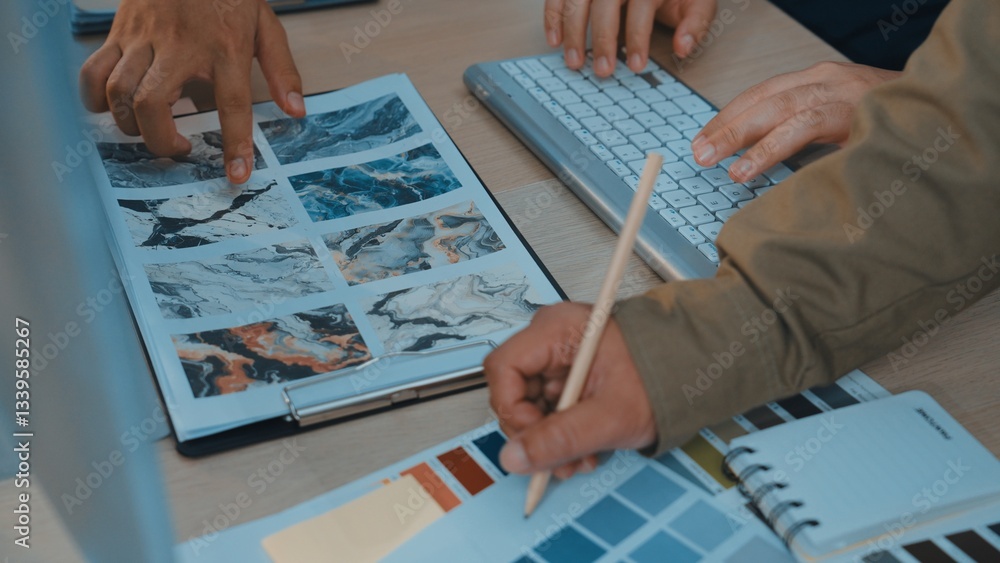 Poster engaging workspace features hands working on color palettes and textures for design projects. captur