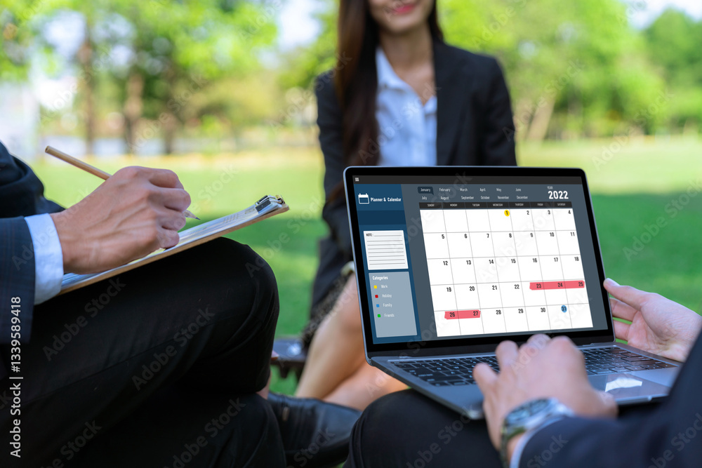 Aufkleber calendar on computer software application for brisk schedule planning for personal organizer and onl