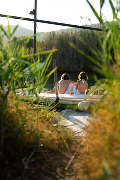 Siblings enjoying a boat ride in Andratx, Mallorca