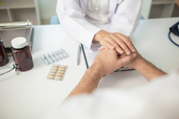 A young man suffering from erectile dysfunction seeks consultation with a specialist to identify...