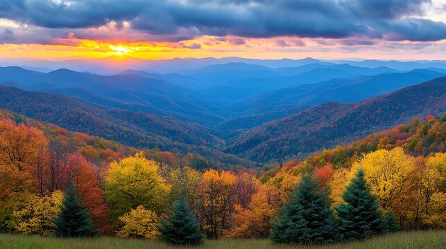 Vibrant autumn sunset over layered mountains. - Powered by Adobe