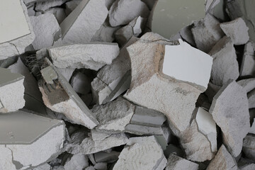 Broken concrete, Piles of lightweight construction bricks after house demolition