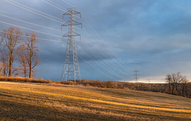 Autumn landscape with transmission towers