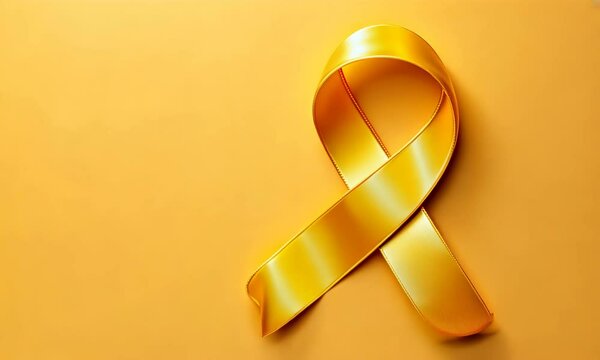 Yellow ribbon on yellow background, symbolizing support for certain causes
