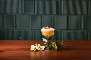 Elegant Passion Fruit Cocktail with Floral Accents