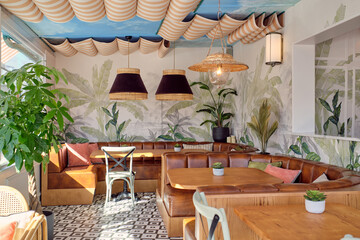 Charming indoor restaurant with tropical and rustic decor