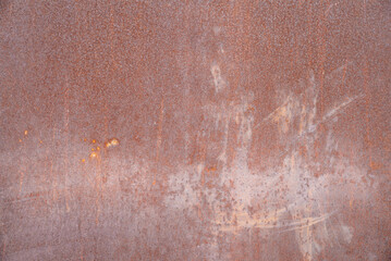 Rusty metal surface with corrosion spots