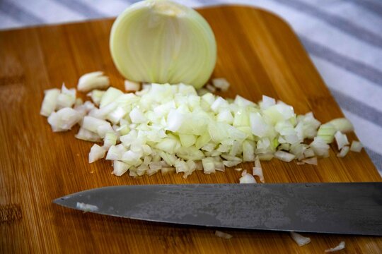 Chopped white onion brunoise style