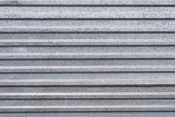 Corrugated galvanized metal surface close-up