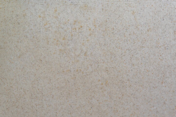 Beige stone surface with fine-grained texture