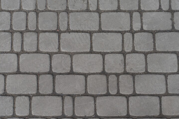 Rectangular stone paving with dark seams
