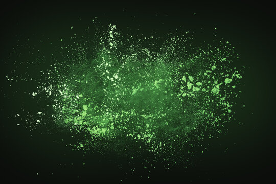 Green color dust explosion on dark background
