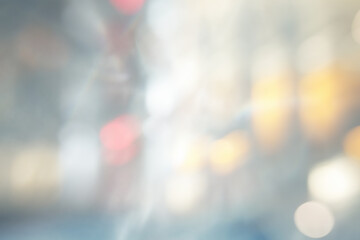 Abstract blur soft focus blinking light beige blue copy space neutral background. Light and shadow smoke refraction.