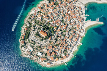 Croatia. Scenic town of Primosten peninsula aerial view, turquoise archipelago