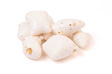 Freeze Dried White Nougat Candy Bar with Pieces of Peanut Isolated on a White Background