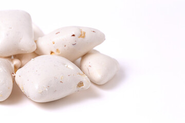 Freeze Dried White Nougat Candy Bar with Pieces of Peanut Isolated on a White Background