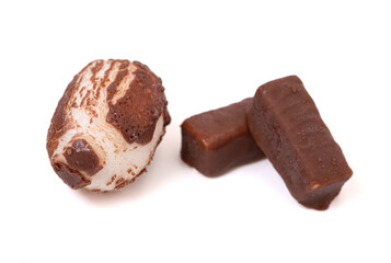Chewy Mini Chocolate Covered Nougat Candies Isolated on a White Background