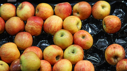 Box of organic apples in a shop