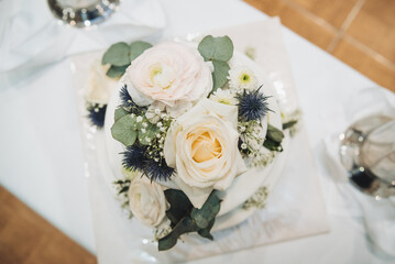 Wedding cake decorated with cream roses. Top view