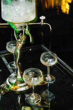 Classic absinthe ritual with fountain and glasses