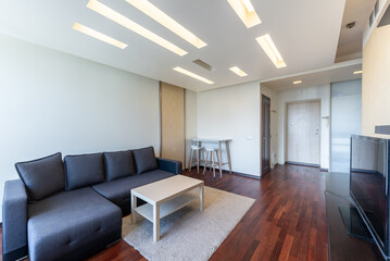 Modern Home Minimalist Living Room with Stylish Interior and Comfortable Seating