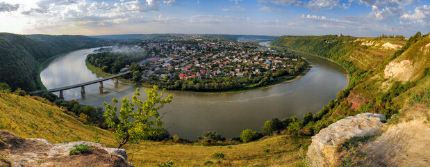 Panoramic landscape showing the Dniester river making a loop around Zalishchyky town in Ukraine, Ternopil region