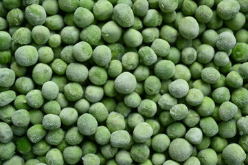 frozen green peas close-up, frozen green peas macro as background	
