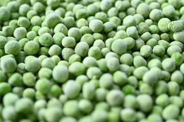 frozen green peas close-up, frozen green peas macro as background	
