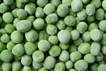 frozen green peas close-up, frozen green peas macro as background 
