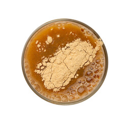 Maca powder drink isolated, dry Peruvian ginseng beverage, powder in water, ground ayak willku tea