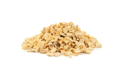 Dry parsley root, dried diced celery cubes, scattered small liquorice pileces, dry vegetable