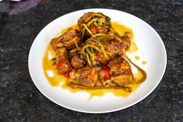 Traditional beef oxtail with watercress, a rustic Brazilian dish