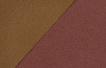 Fototapeta premium Brown and red textured paper background with a minimalist geometric design. Ideal for creative projects.