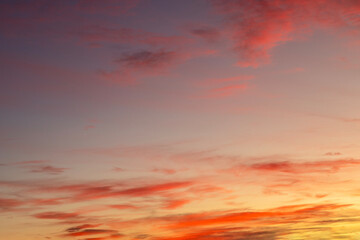 Fototapeta premium Colorful evening sky with vibrant orange and pink hues during sunset